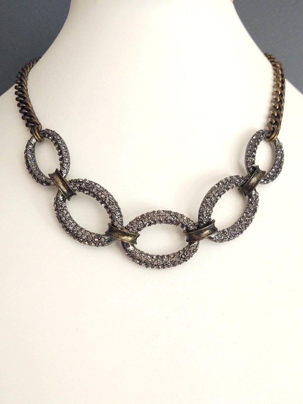 Antique brass link and chain necklace with gray pave crystals